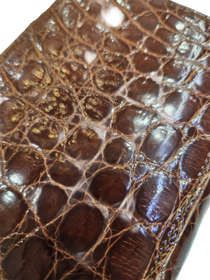 Portafoglio donna in vero coccodrillo.