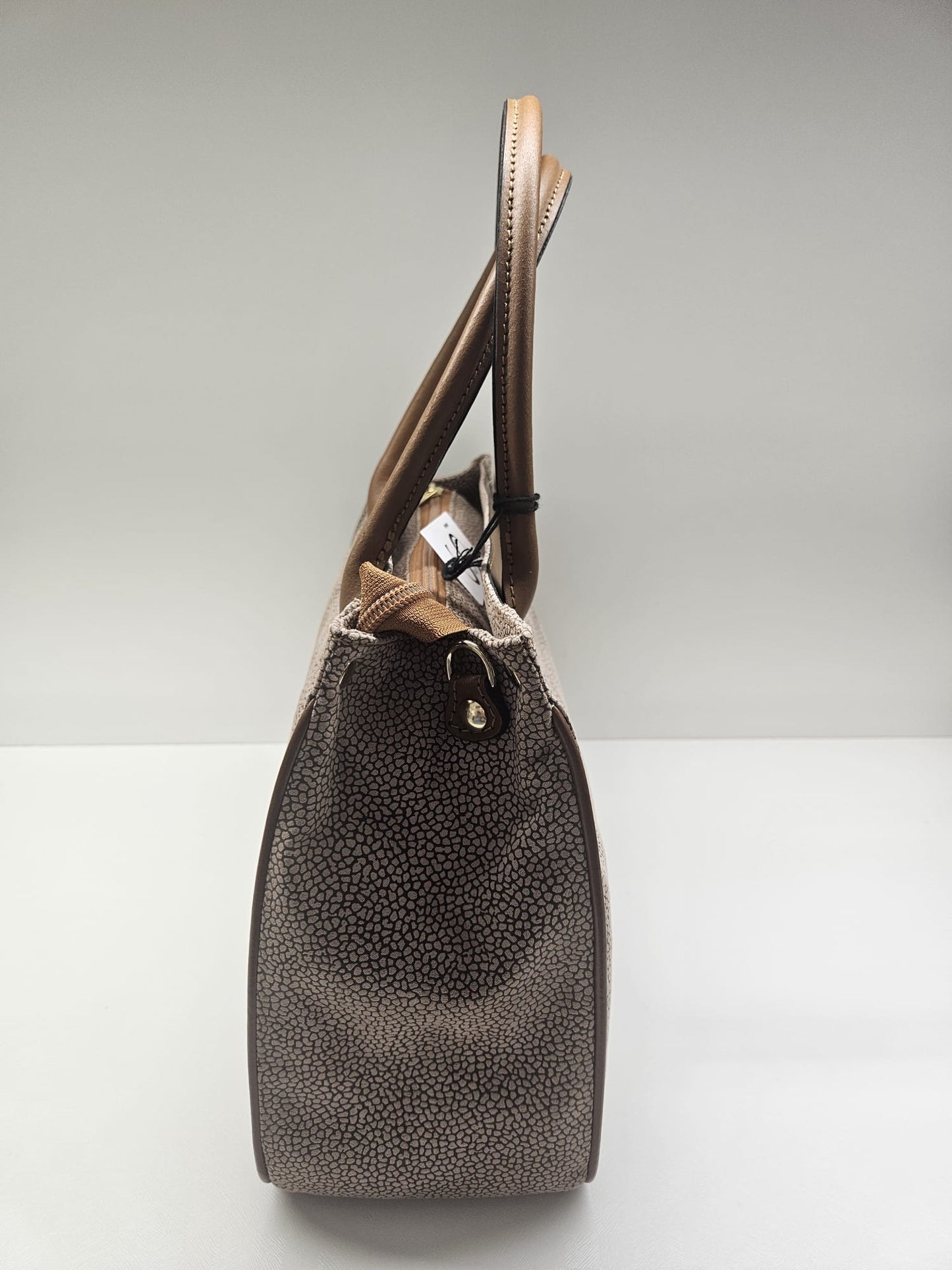 Borsa donna linea Simo in stampo &nbsp;tapiro con rifiniture in pelle di vitello