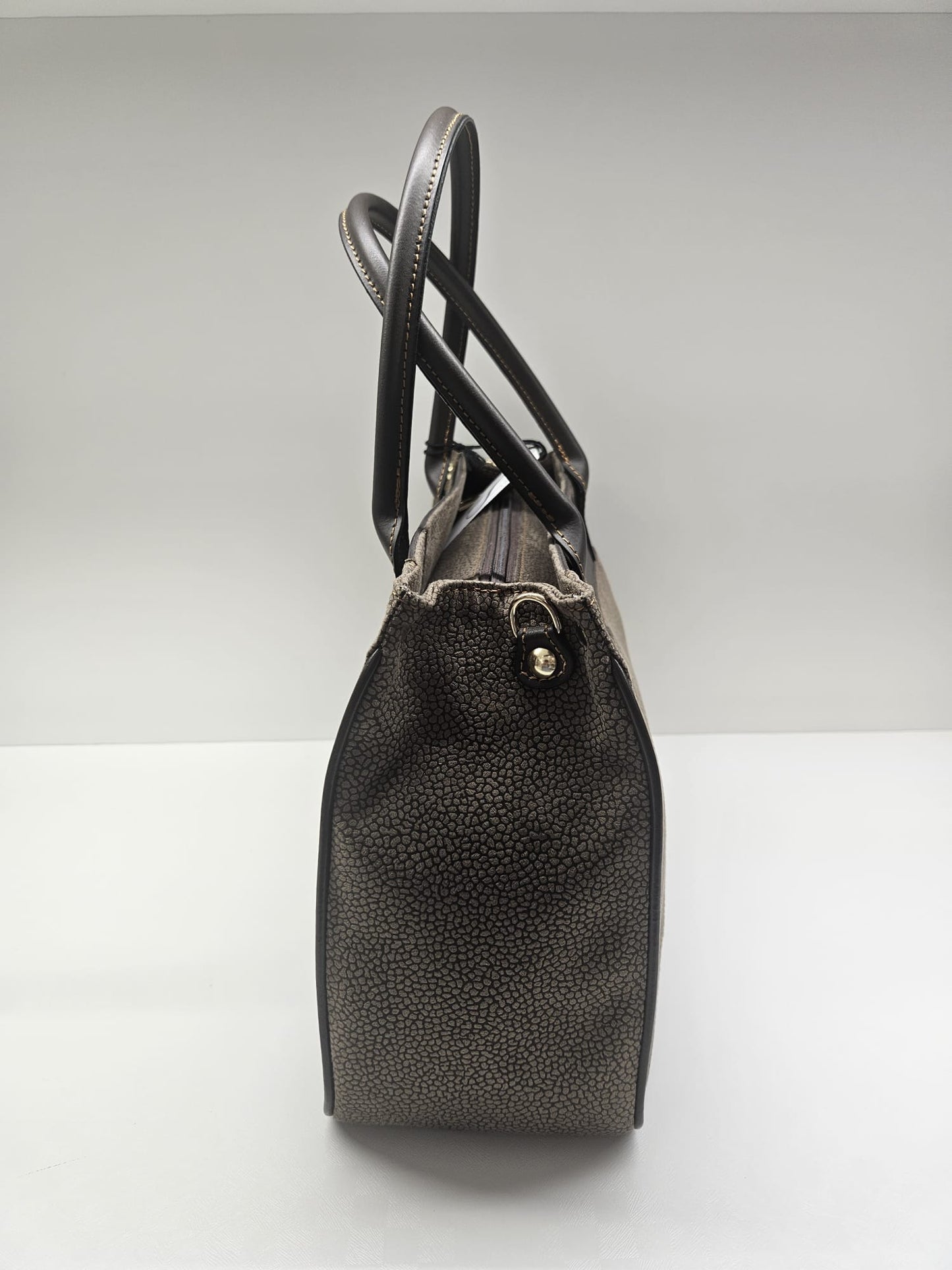 Borsa donna linea Simo in stampo &nbsp;tapiro con rifiniture in pelle di vitello